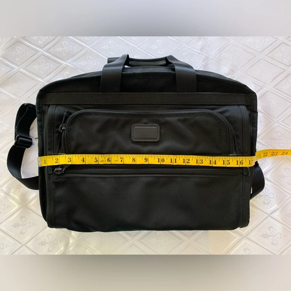 Tumi Black Travel Bag with Adjustable Strap